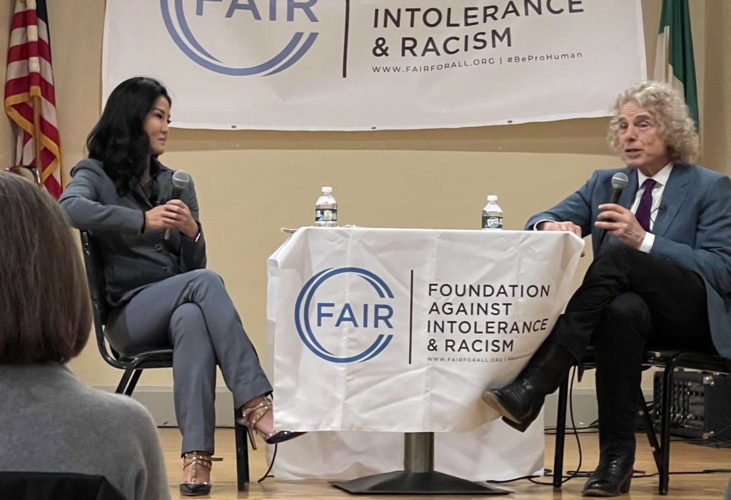 Steven Pinker and Melissa Chen on stage